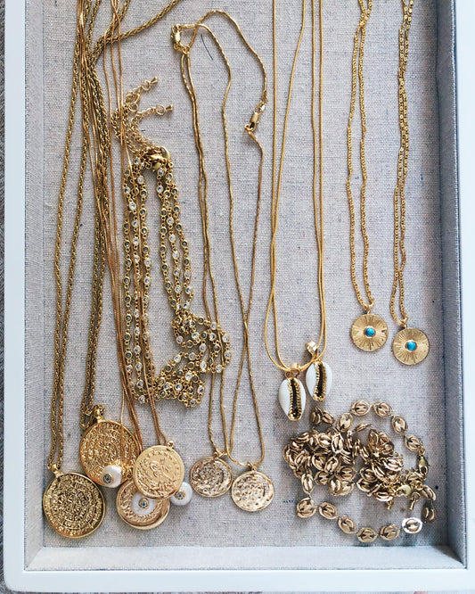 Shop the latest in Coin Jewelry